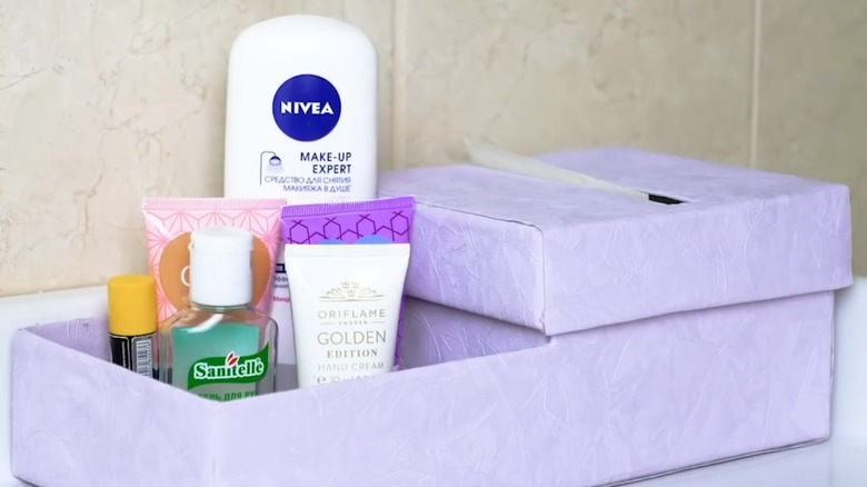 Bathroom product organizer and tissue box dispenser made from shoe box