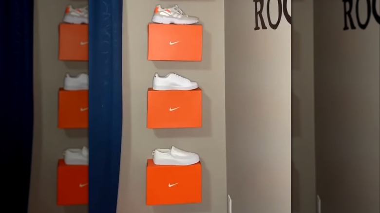 shoe boxes mounted on wall for shoe storage
