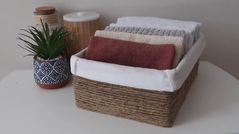 Rustic jute basket with fabric lining made out of a shoe box