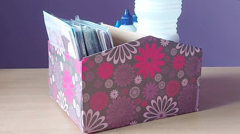 Craft supply organizer made out of a shoe box