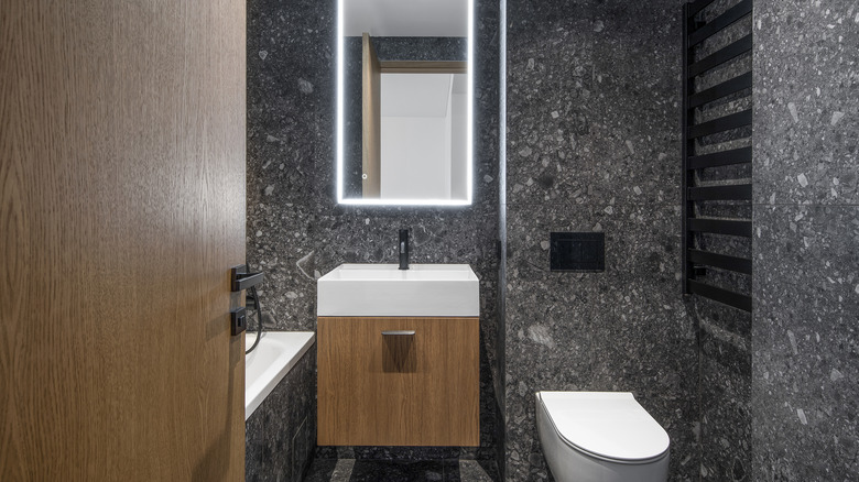 Gray bathroom with wooden details