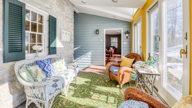 Blue and yellow sunroom