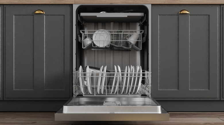 An open dishwasher with dishes
