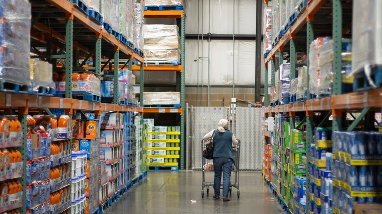 woman shopping in the household goods aisle of Costco
