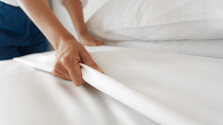 Woman making the bed