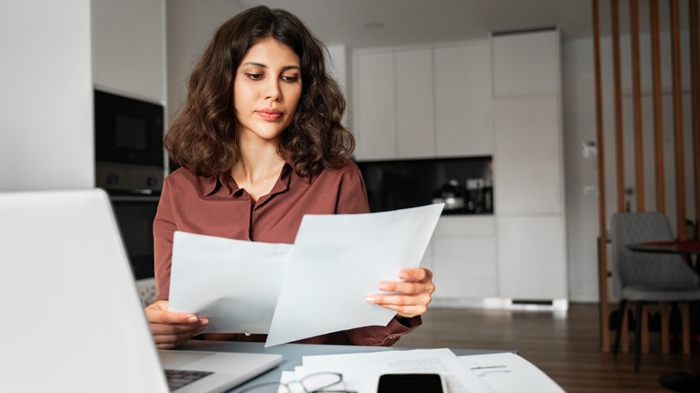woman working alone in kitchen