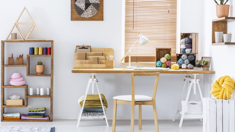 shelves and desk with crafts