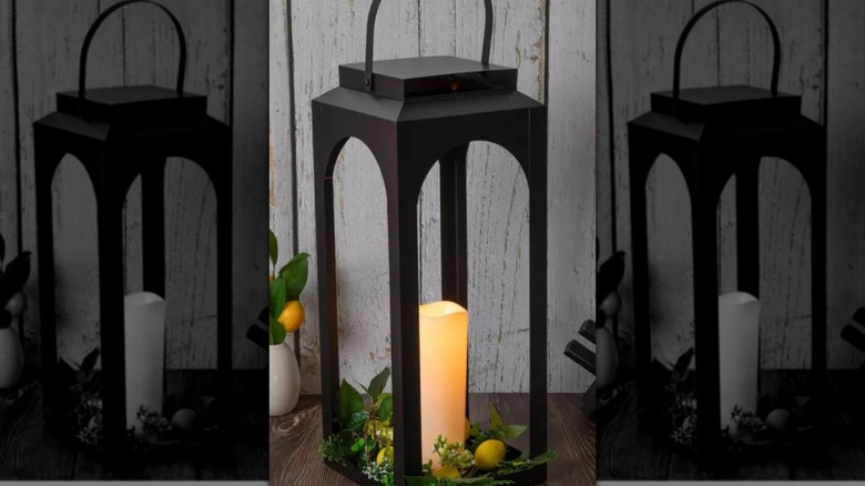 Black metal LED lemon lantern from Hobby Lobby on a table