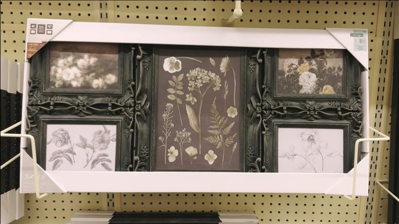 Set of floral framed art on a shelf at Hobby Lobby