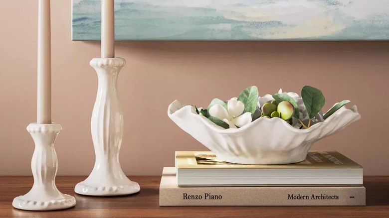 candle stick holders styled on a side table