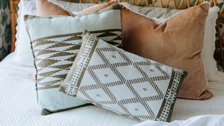 Closeup of throw pillows with geometric patterns