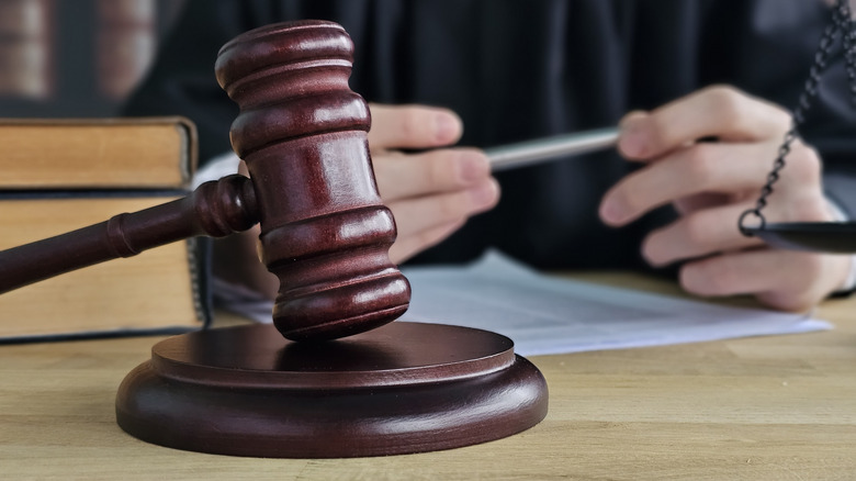Judge uses gavel during court session