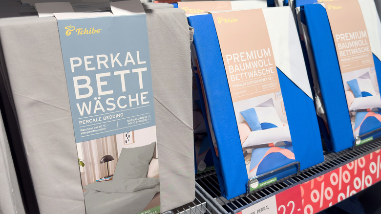 Percale bedding sheets stocked on a shelf