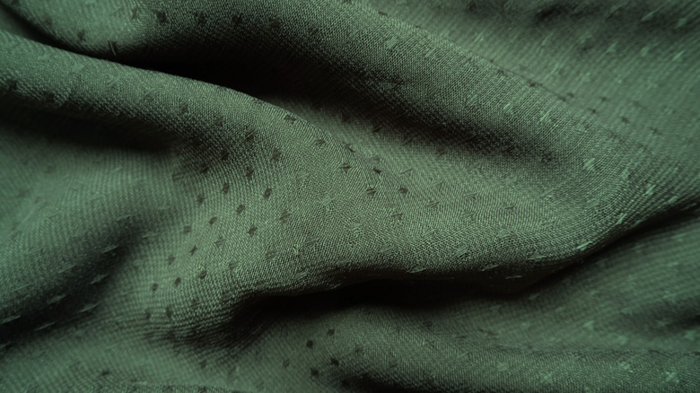A close up of an emerald dobby fabric