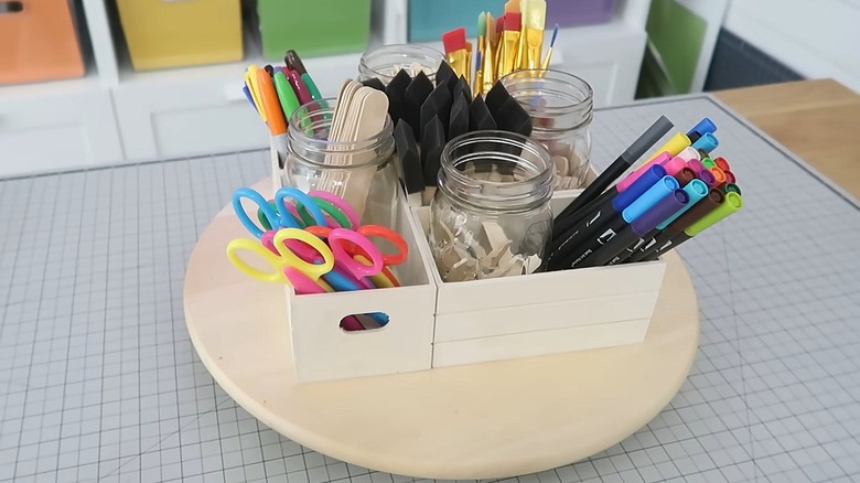 Crates glued together to make a craft organizer on top of a lazy Susan