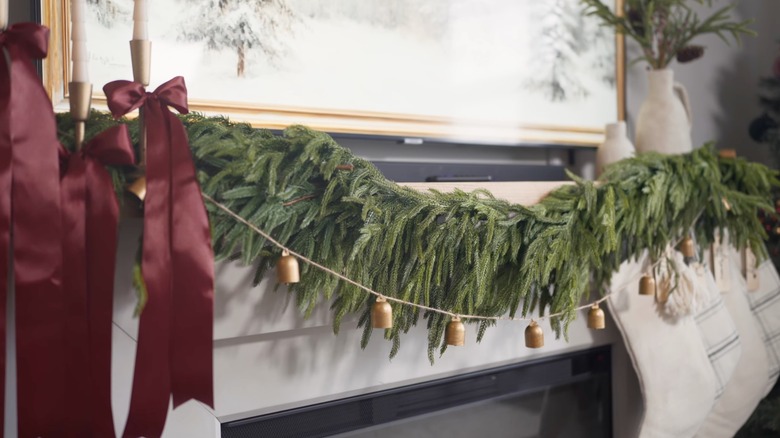 Bell garland on fireplace mantel