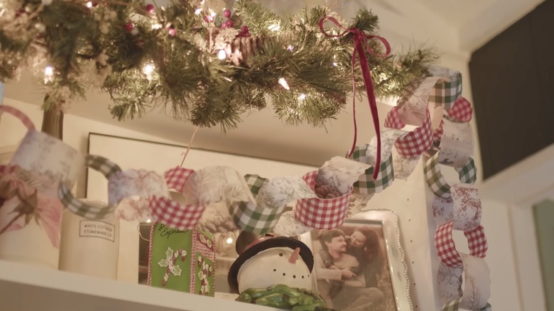 paper garland decoration in front of shelves