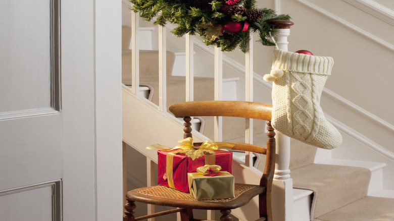 Evergreen garland on stair railing