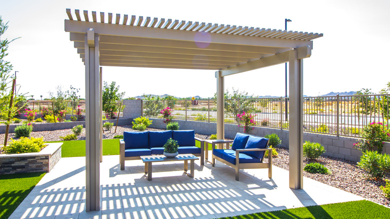 Outdoor pergola with seating area