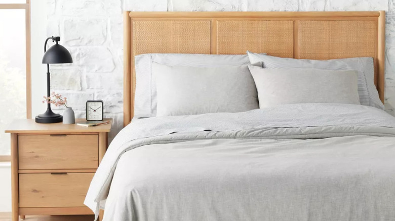 tan rattan and wood headboard