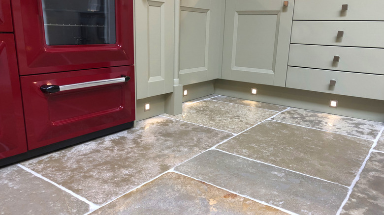 A close-up of beautiful stone flooring in a kitchen