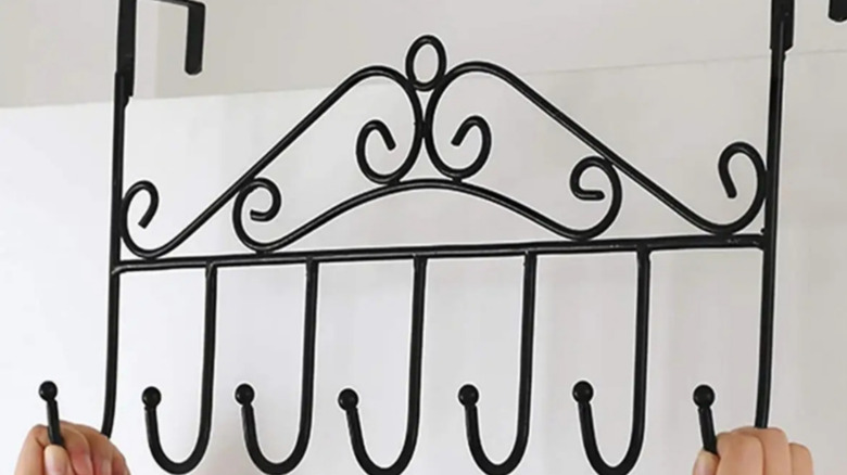 An over-the-door hanger with hanging hooks