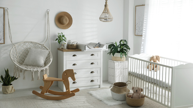 white farmhouse nursery with plants