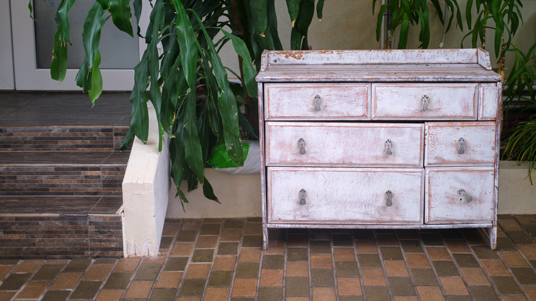 A vintage distressed dresser.