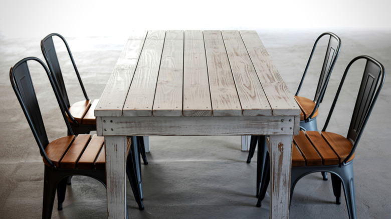 A distressed farmhouse table.