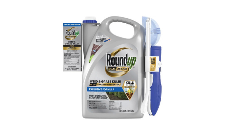 A bottle of Roundup's Dual Action Weed and Grass Killer on a white background