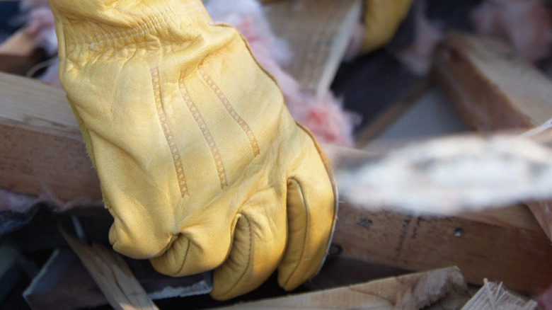 Close-up of Wells Lamont's Men's Leather Work Gloves in use