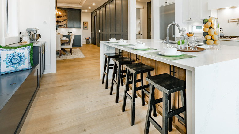 wooden floors in white kitchen