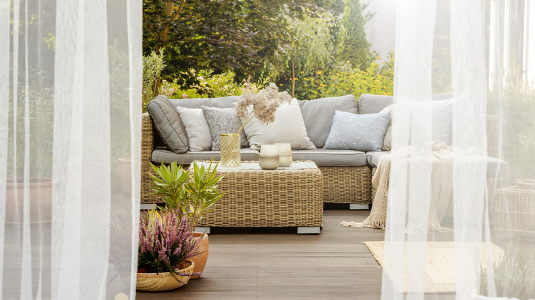 colorful porch chairs and railing