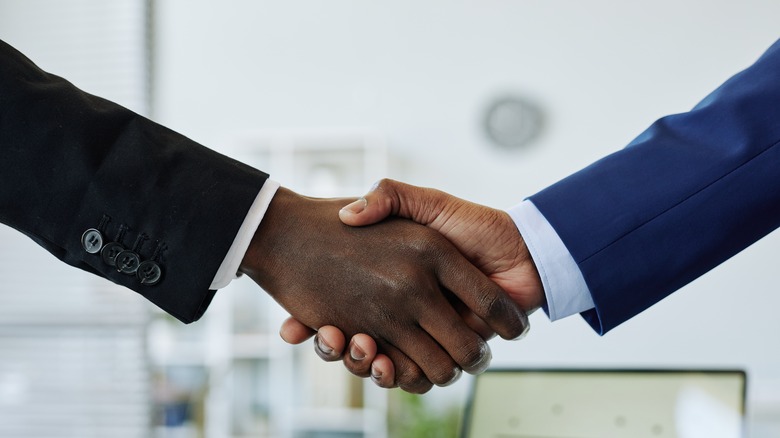 men shaking hands