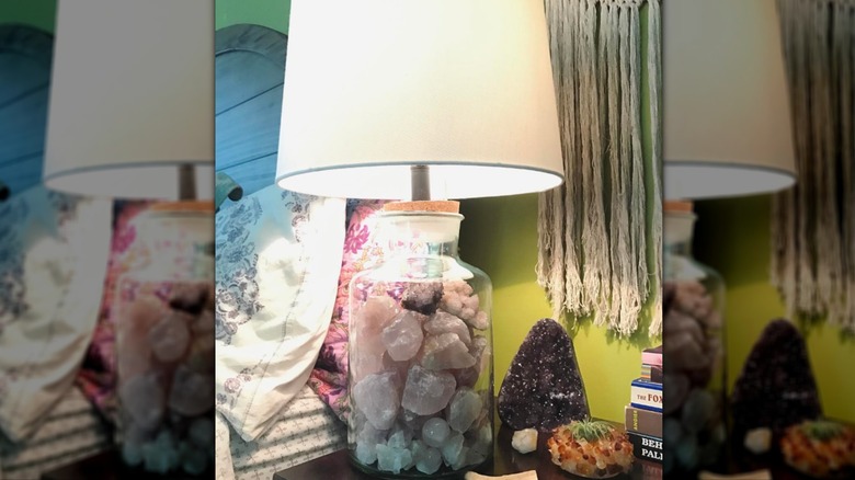 Rose quartz crystals in a clear table lamp