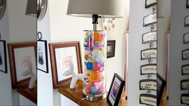 Plastic vending machine capsules in a lamp base
