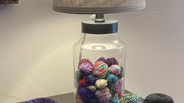 Yarn balls in a clear lamp base