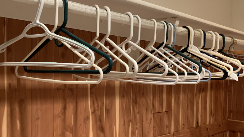 Extra empty hangers hanging in closet