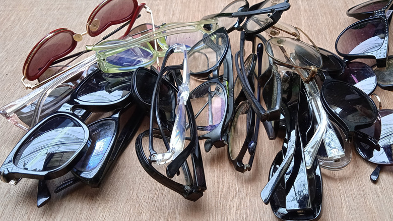 Pile of sunglasses and glasses