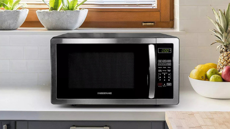 A Faberware microwave on a kitchen counter