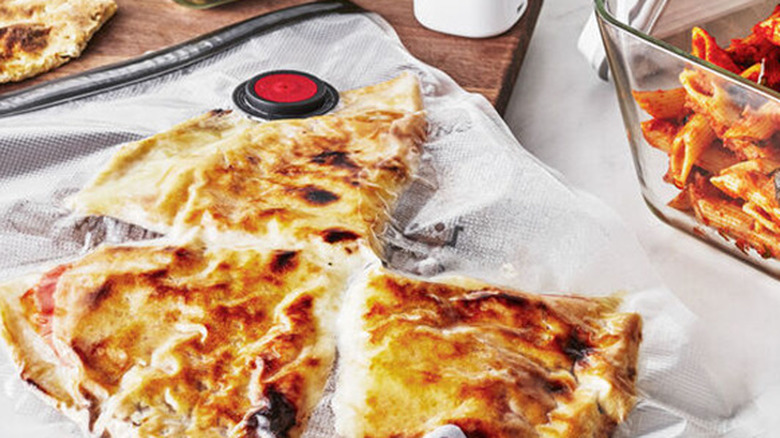 Pizza slices in a vacuum sealed bag