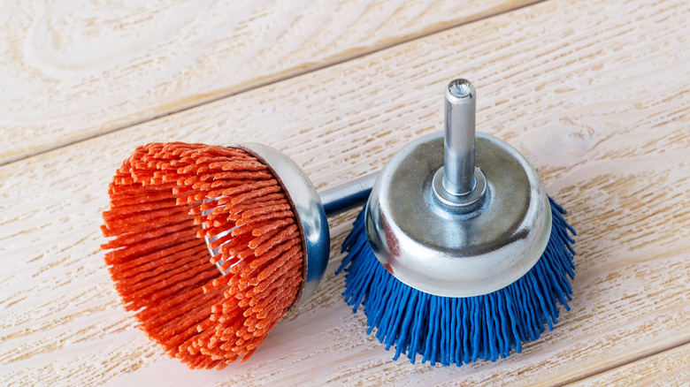 Scrubbing attachments for drill or scrubbing brush on a wood surface