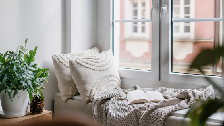 Cozy home with neutral textiles and plants