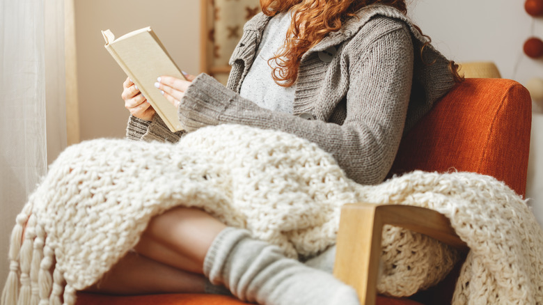 Wool blanket on woman's lap