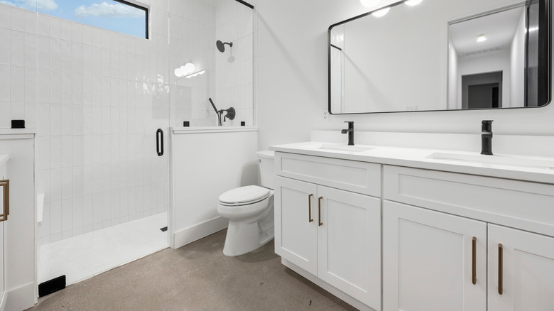 White luxury bathroom with black fixtures