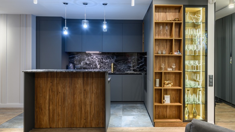 Asymmetrical wooden shelves in hutch