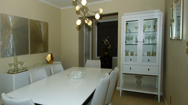 White hutch in dining room