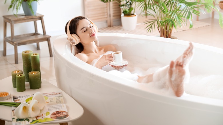 Woman relaxing in tub