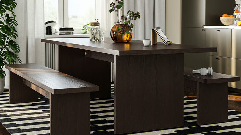 The BERGSHYTTAN Table in dark brown ash in a home kitchen