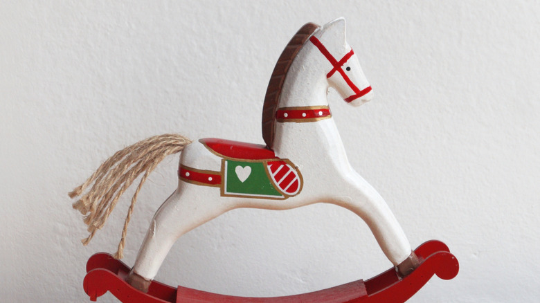 Hand-painted wooden horse ornament